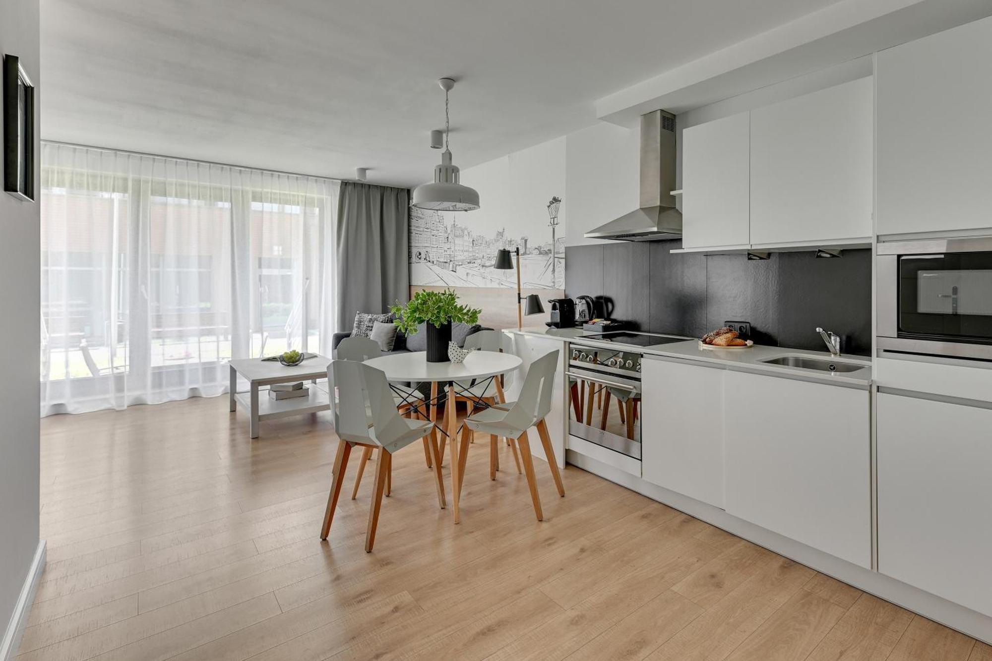 Waterlane Riverside - Spa, Pool, Gym & Parking By Downtown Apartments غدانسك الغرفة الصورة