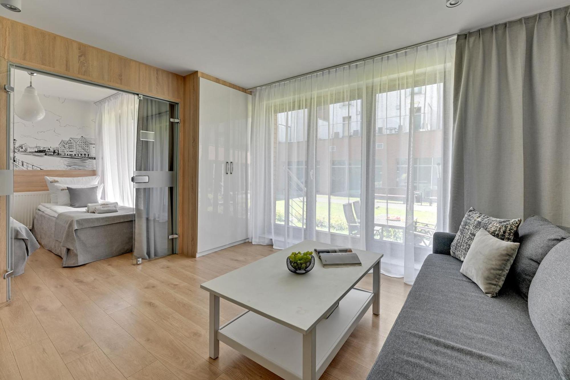 Waterlane Riverside - Spa, Pool, Gym & Parking By Downtown Apartments غدانسك المظهر الخارجي الصورة